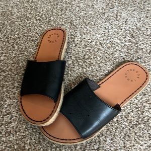 Black slide leather sandals